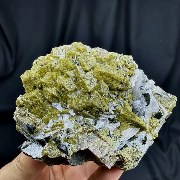 Olive-green grossular garnet crystals with white calcite blades from Inner Mongolia, China