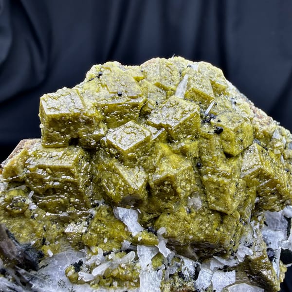 Olive-green grossular garnet crystals with white calcite blades from Inner Mongolia, China, reverse side