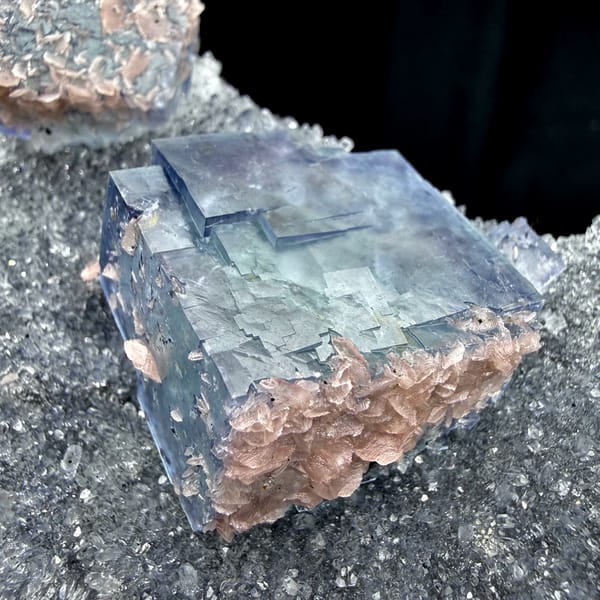Blue-and-white porcelain fluorite cubes on quartz with rhodochrosite from Wuzhou, Guangxi, China, second angle