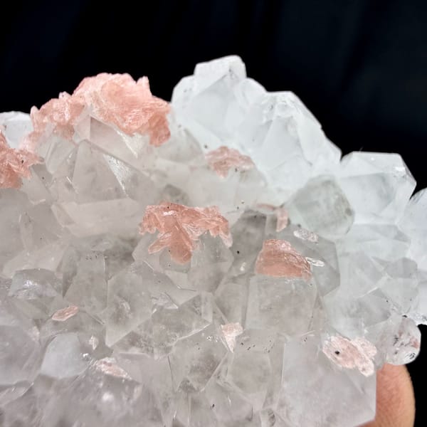 Pink rhodochrosite under frosted quartz crystals from Wuzhou, Guangxi, China, second angle