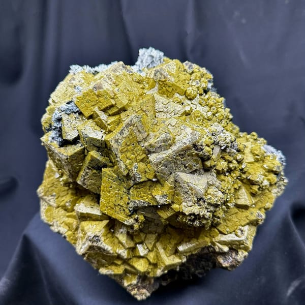 Very large block of olive-green grossular garnet with calcite from Inner Mongolia, China