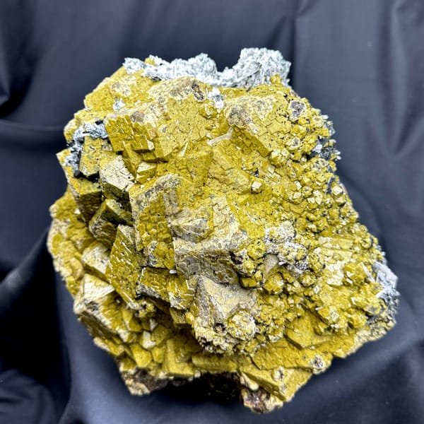 Very large block of olive-green grossular garnet with calcite from Inner Mongolia, China, top view