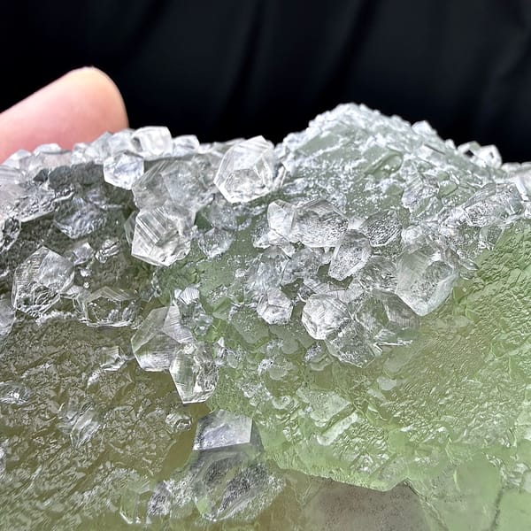 Pale green fluorite floater with clear calcite crystals from Fujian, China, reverse side