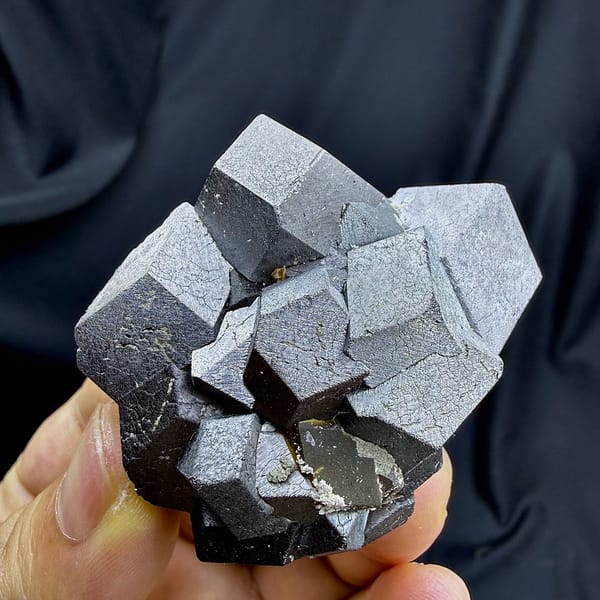 Cluster of large steel-grey magnetite crystals from Inner Mongolia, China, second angle