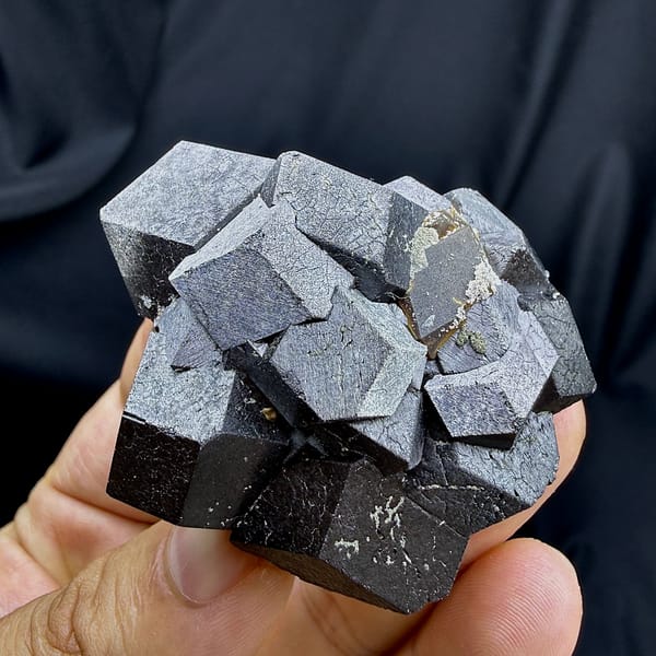 Cluster of large steel-grey magnetite crystals from Inner Mongolia, China, reverse side