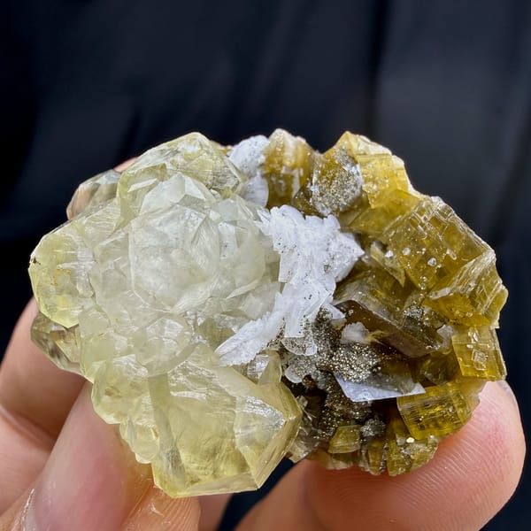 Yellow calcite rosette on brown siderite and dolomite from Guizhou, China, top view