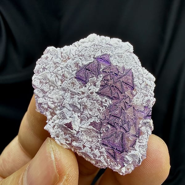 Deep purple triangular fluorite crystals in white aragonite from Yunnan, China, second angle