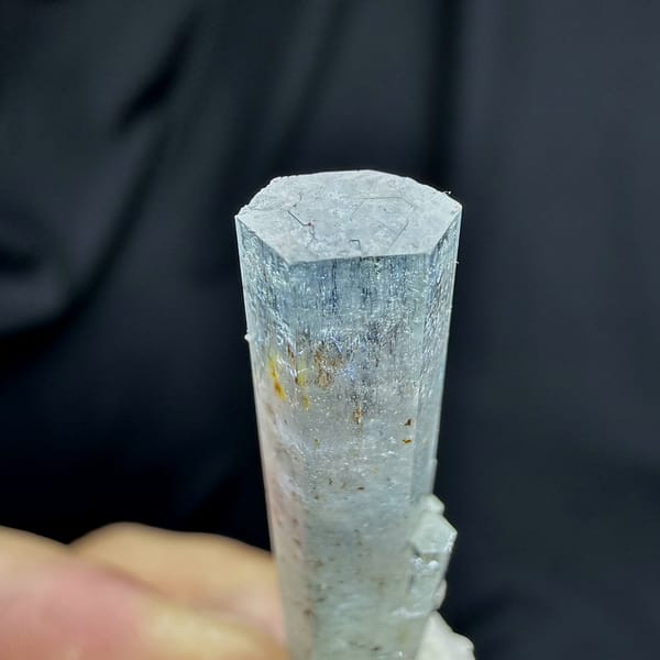 Sky-blue aquamarine prism standing on white feldspar from Namibia, second angle