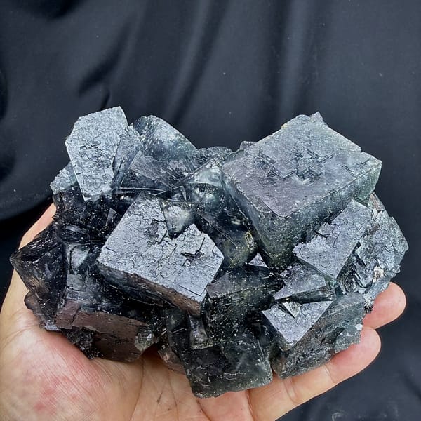 Large blue-grey daylight fluorite cubes with pyrite from Nigeria, close-up of the crystal faces