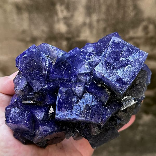 Large blue-grey daylight fluorite cubes with pyrite from Nigeria, reverse side