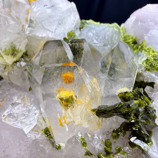 Milky garden quartz crystals with green epidote from Sichuan, China, second angle