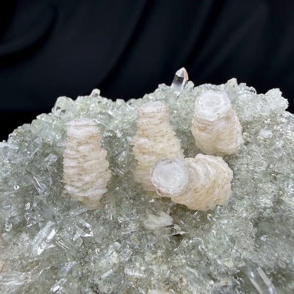 Three stacked pagoda calcite towers on quartz needles from Fujian, China, reverse side