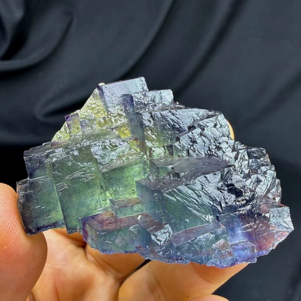 Stepped blue fluorite overgrowing green octahedral fluorite from Jiangxi, China, reverse side