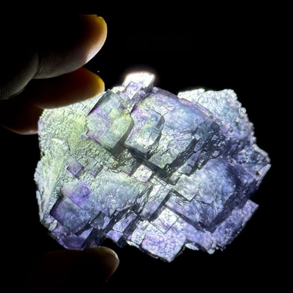 Stepped blue fluorite overgrowing green octahedral fluorite from Jiangxi, China, top view
