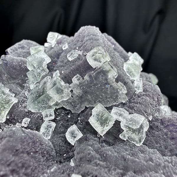 Muted lavender recrystallised fluorite with small green cubes from Fujian, China, second angle