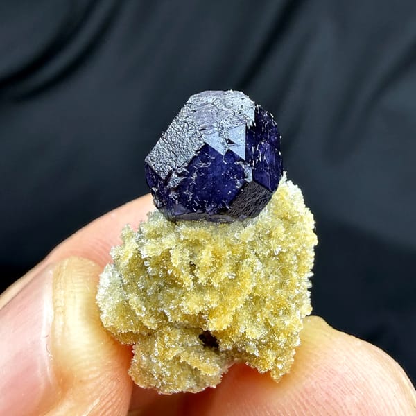Deep blue fluorite octahedron on pale zeolite pedestal from Yunxiao, Fujian, China, reverse side