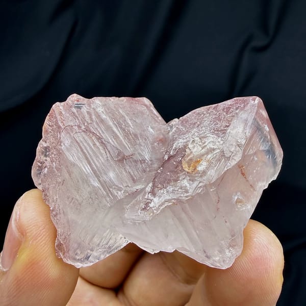 Pink lingzhi-mushroom shaped calcite floater from Guangdong, China, reverse side