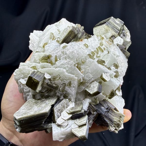Large white feldspar block with bronze mica books from Pakistan, top view