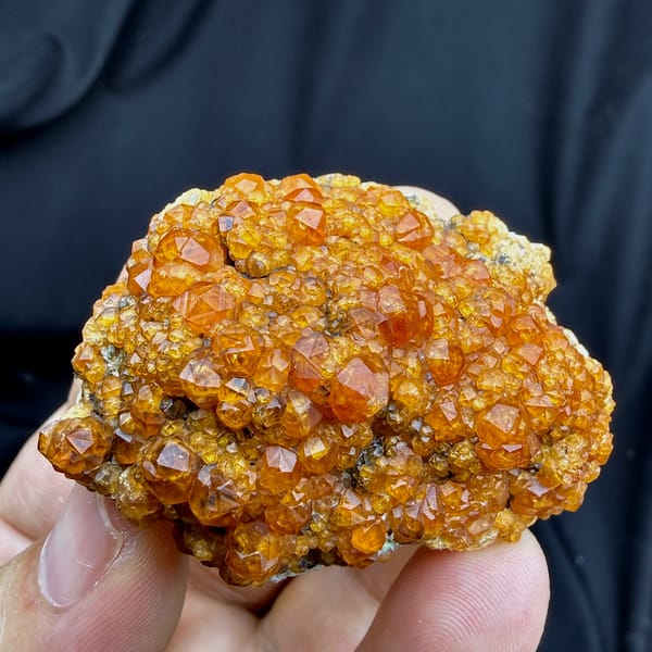 Plate of Fanta-orange spessartine garnet crystals from Yunxiao, Fujian, China, second angle