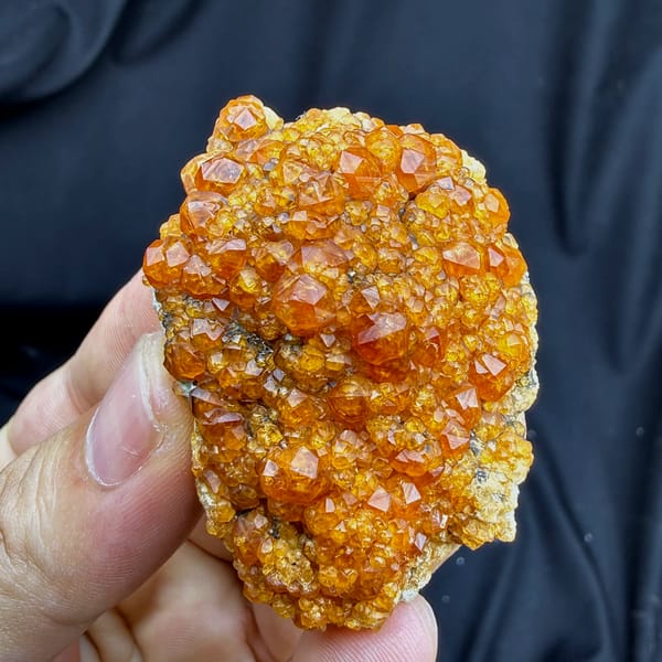 Plate of Fanta-orange spessartine garnet crystals from Yunxiao, Fujian, China, reverse side