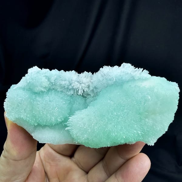 Aqua-blue acicular aragonite flower mounds from Yunnan, China, reverse side