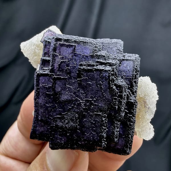 Deep violet fluorite cube with phantom zoning on quartz from Inner Mongolia, China, second angle