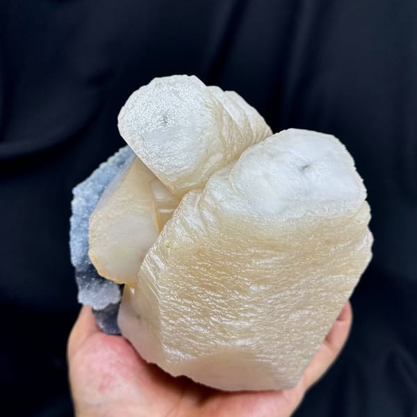 Huge cream calcite prisms with green fluorite and quartz from Fujian, China, top view