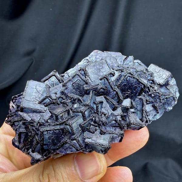 Inky blue fluorite cubes with purple rims from Inner Mongolia, China, reverse side