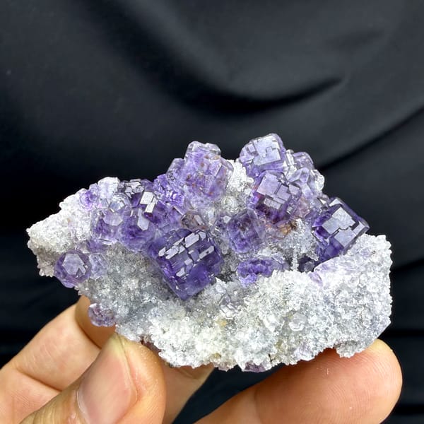 Violet-blue fluorite cubes on white quartz from Fujian, China, top view