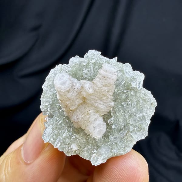 Stacked pagoda calcite tower on quartz needles from Fujian, China, reverse side