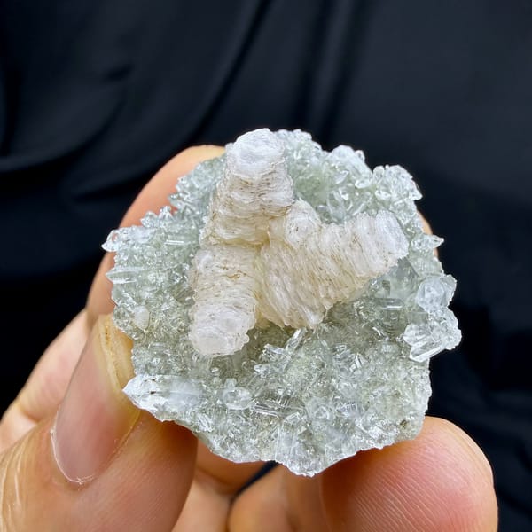 Stacked pagoda calcite tower on quartz needles from Fujian, China, top view
