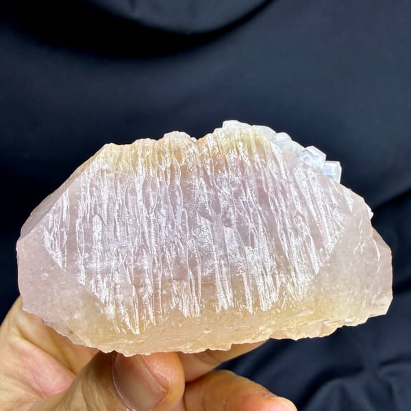 Large pink and yellow two-tone apophyllite crystal from Fujian, China, close-up of the crystal faces