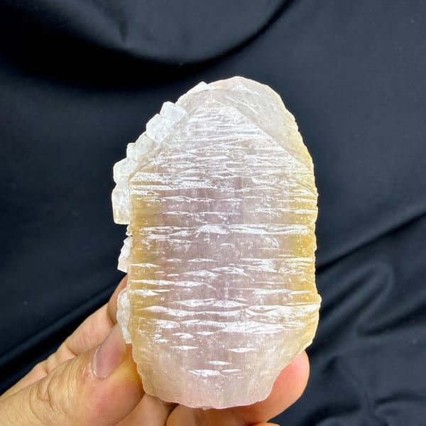 Large pink and yellow two-tone apophyllite crystal from Fujian, China, detail of the matrix contact