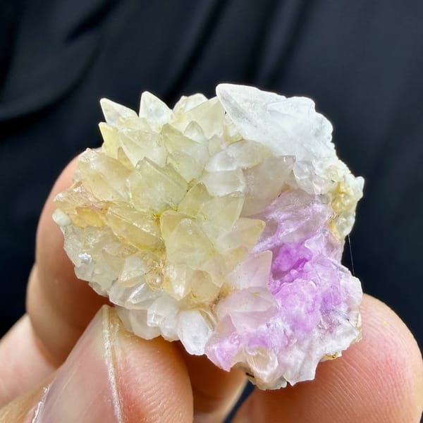 Yellow dogtooth calcite with pink cobalt aragonite from Yunnan, China, top view