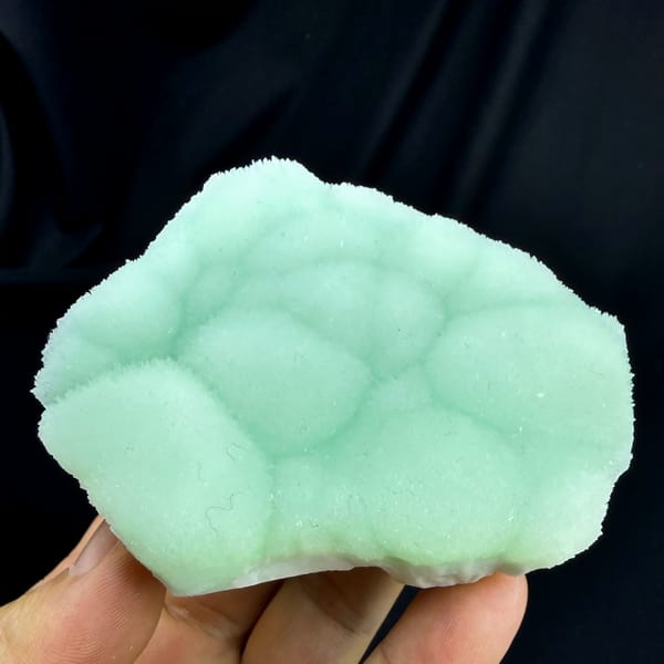 Pastel-green botryoidal aragonite plate from Yunnan, China, second angle