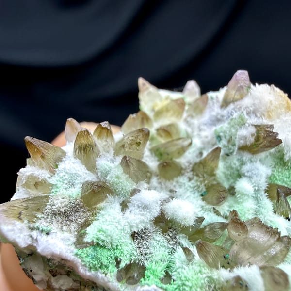 Amber dogtooth calcite with green copper minerals and aragonite from Yunnan, China, second angle