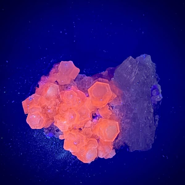 Hexagonal calcite crystals with champagne apophyllite from Fujian, China, second angle