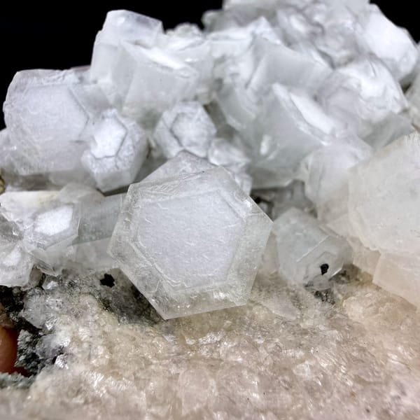 Hexagonal calcite crystals with champagne apophyllite from Fujian, China, reverse side