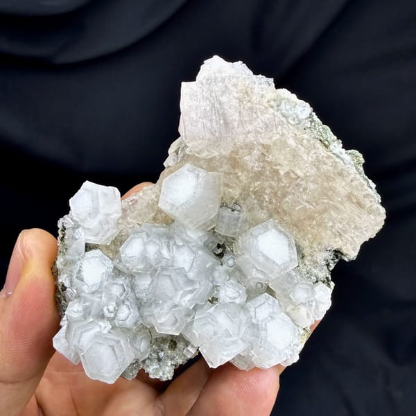Hexagonal calcite crystals with champagne apophyllite from Fujian, China, top view