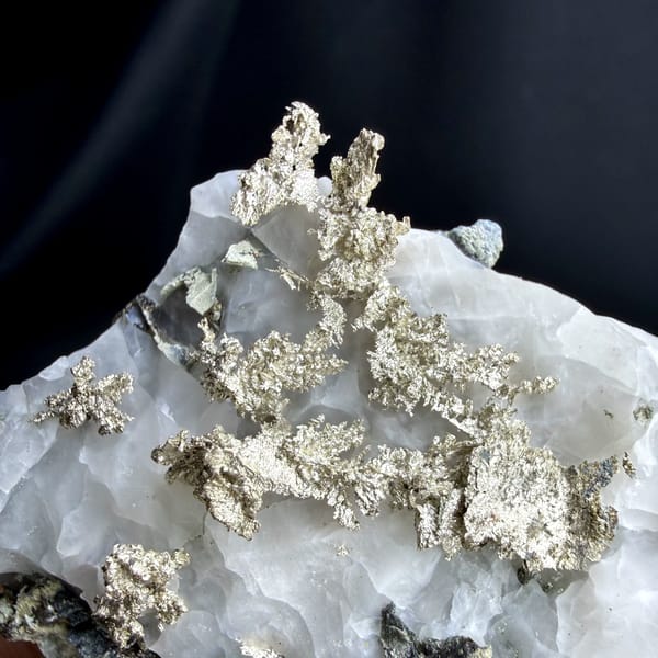 Native silver wires on white calcite from the USA, second angle
