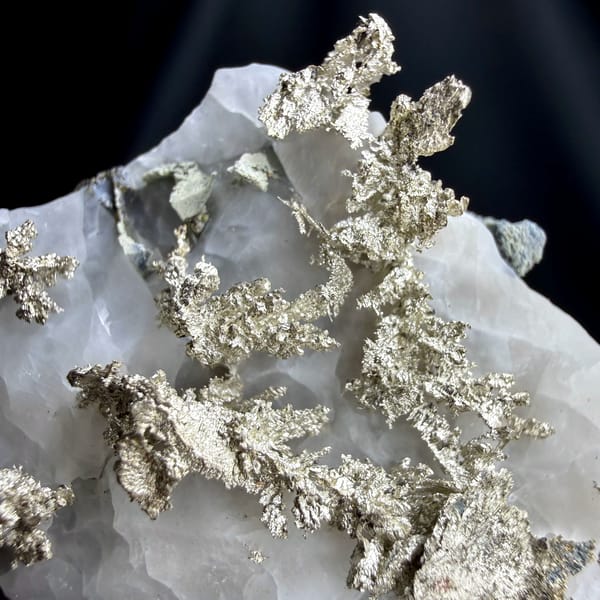 Native silver wires on white calcite from the USA, reverse side