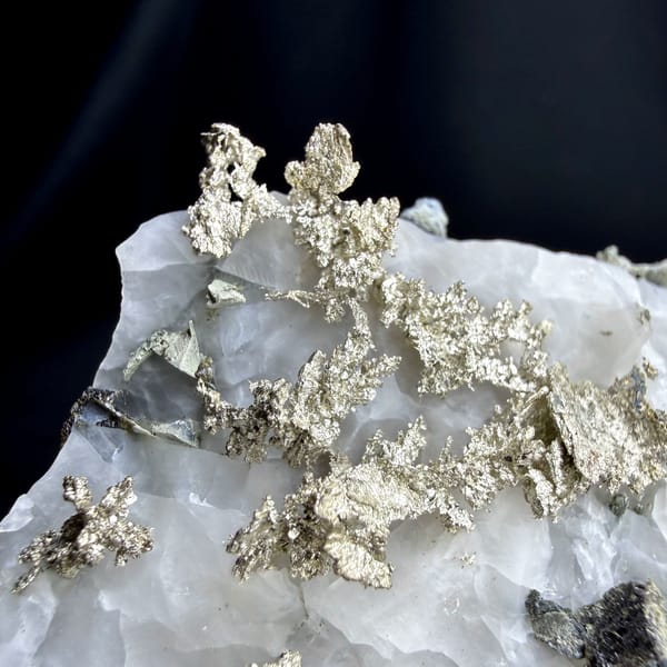 Native silver wires on white calcite from the USA, top view