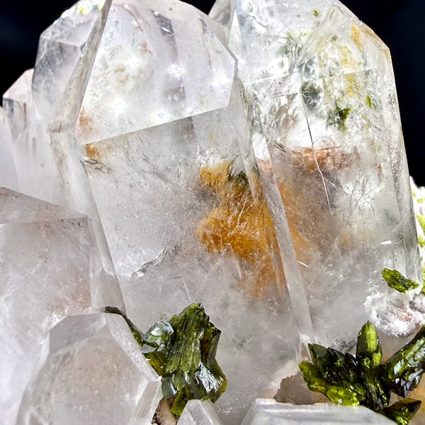 Large clear garden quartz crystals with green epidote from Sichuan, China, reverse side
