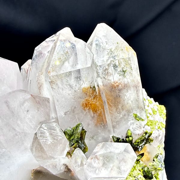 Large clear garden quartz crystals with green epidote from Sichuan, China, top view