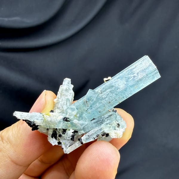 Sea-green aquamarine prism with black schorl on feldspar from Namibia, reverse side