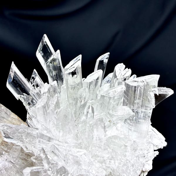 Long fan of transparent gypsum prisms from Guizhou, China, second angle