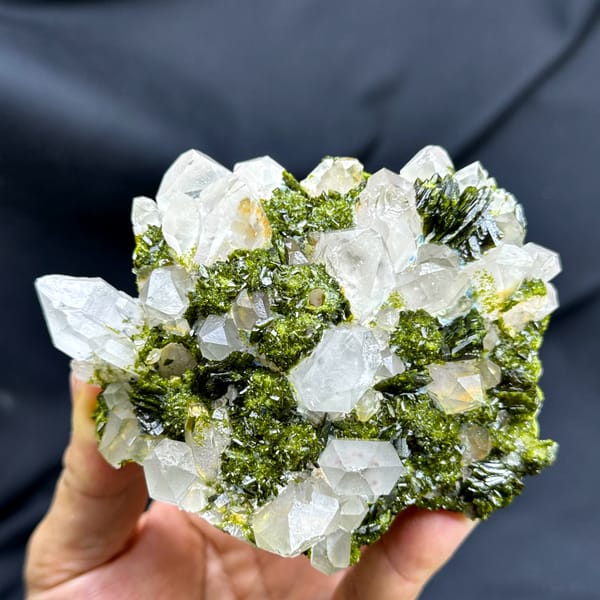 Green botryoidal epidote between milky garden quartz crystals from Sichuan, China, second angle