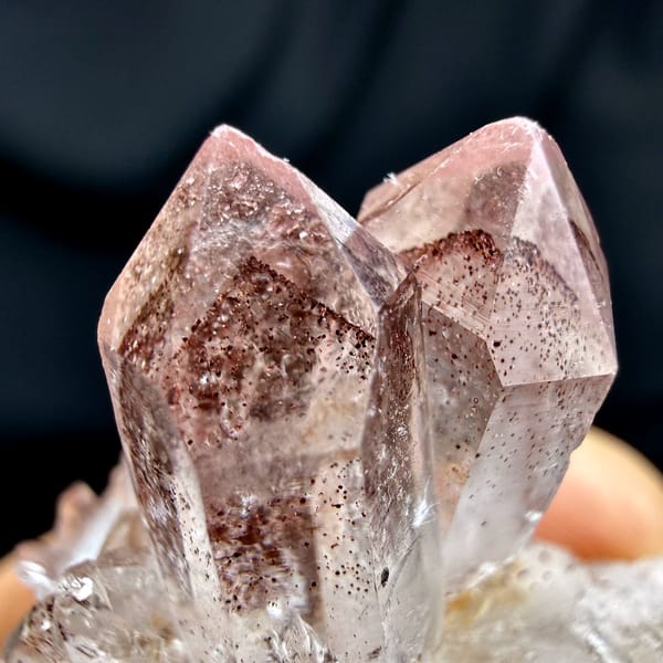 Strawberry-red phantom quartz crystal on white druse from Shanxi, China, second angle