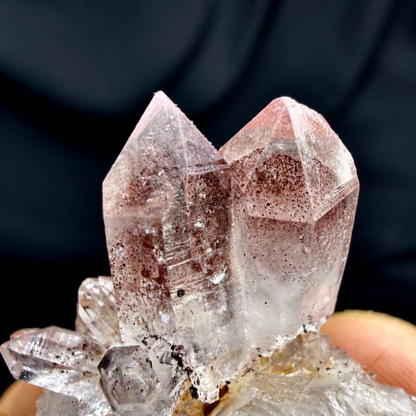 Strawberry-red phantom quartz crystal on white druse from Shanxi, China, reverse side