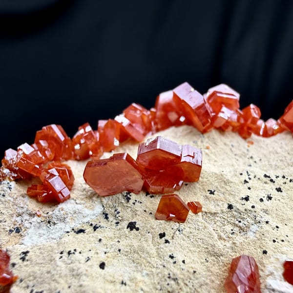 Fiery red vanadinite crystals on pale matrix from Morocco, second angle